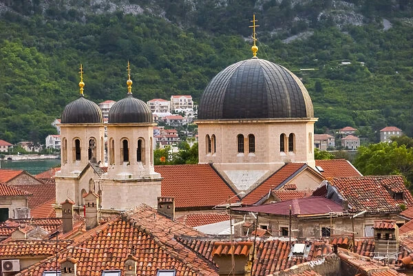 Serbian Orthodox Church of Saint Nicholas and red roof houses, Kotor, Montenegro