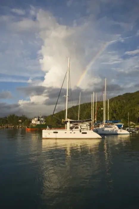 Framed Print : Seychelles, La Digue Island, La Passe, harbor at dusk with rainbow Framed Print : Seychelles, La Digue Island, La Passe, harbor at dusk with rainbow