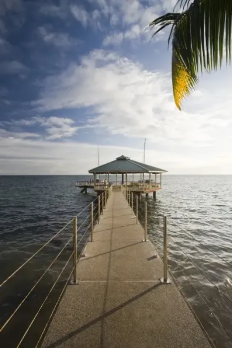 Framed Print : Seychelles, Praslin Island, Anse Bois de Rose, pier at Coco de Mer Hotel
