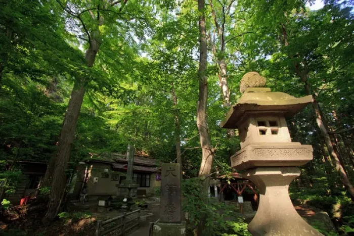 Framed Print : Shinto stone lantern known as ishidoro at the entrance to the walk to Framed Print : Shinto stone lantern known as ishidoro at the entrance to the walk to