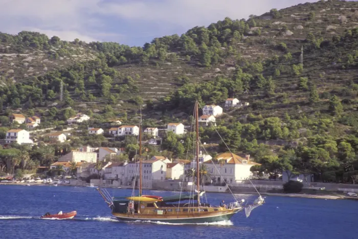 Framed Print : A ship sails into harbor at Vis Town. Vis Island. Croatia. NR