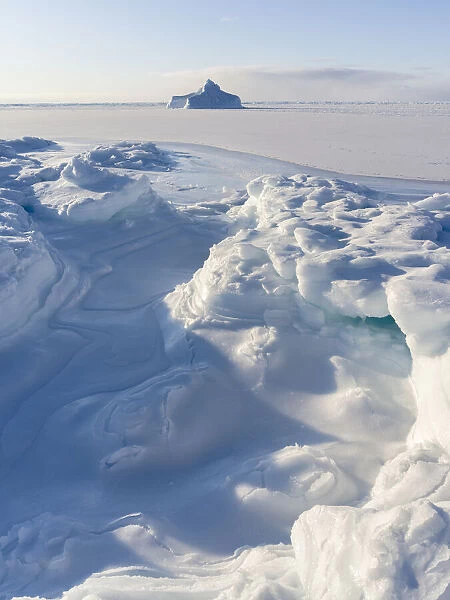 Shore of frozen Disko Bay during winter, West Greenland, Denmark