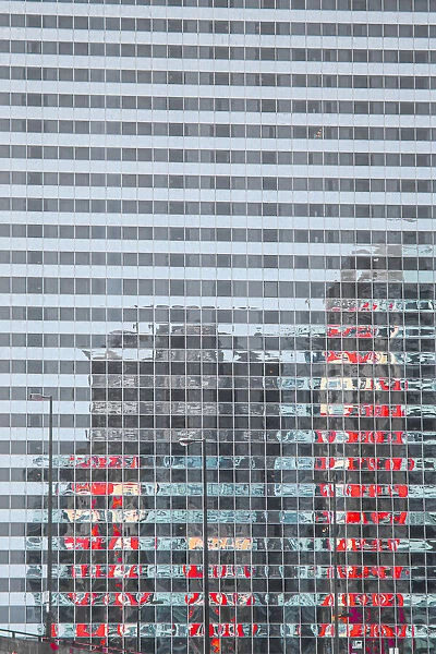 Shot from the Chicago River in downtown Chicago, reflections of city skyline in a massive