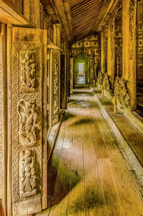 Framed Print : Shwemawdaw Golden Palace Monastery, Mandalay, Myanmar. Interior view of carved doorways adorning elaborate teakwood monastery