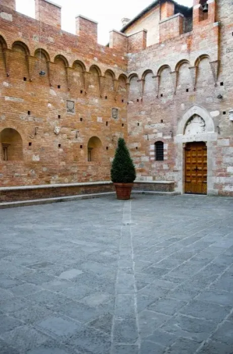 Framed Print : Sienna, Tuscany, Italy - The courtyard of an old world building with a single potted Framed Print : Sienna, Tuscany, Italy - The courtyard of an old world building with a single potted