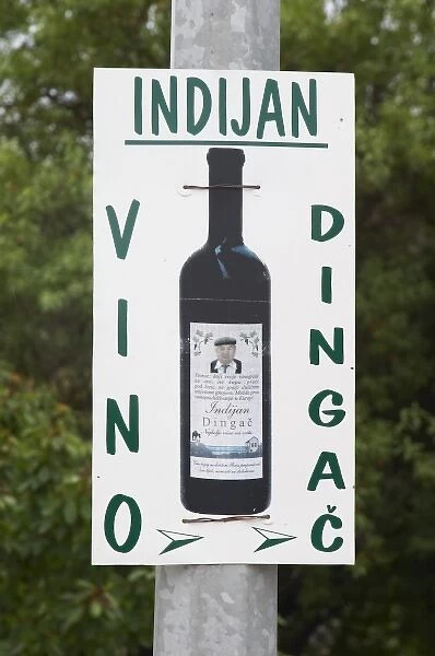 Sign advertising Indijan Vino Dingac, the Indian Winery. Potmje village, Dingac wine region