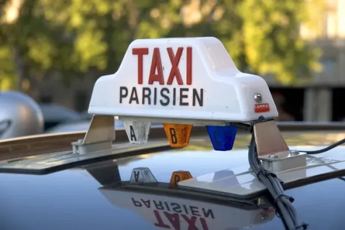 Framed Print : Sign atop a taxi in Paris, France Framed Print : Sign atop a taxi in Paris, France