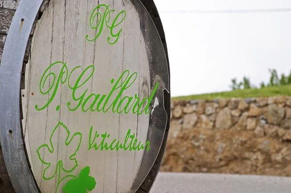 Sign on an old barrel welcoming visitors to Pierre Gaillard Winery, viticulteur