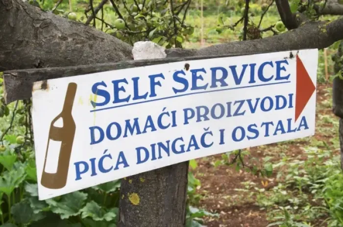 Framed Print : Sign saying Self Service Domaci Proizvodi, Pica Dingac i Ostala, inviting visitors