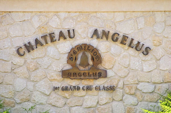 Sign on stone wall saying Chateau Angelus 1er premier first cru classe Saint Emilion