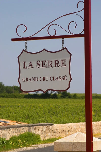 A sign in the vineyard saying Chateau La Serre Grand Cru Classe Saint Emilion Bordeaux
