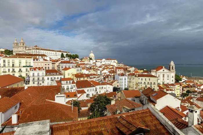 Framed Print : Signature red roof tile buildings at overview in Lisbon, Portugal Framed Print : Signature red roof tile buildings at overview in Lisbon, Portugal