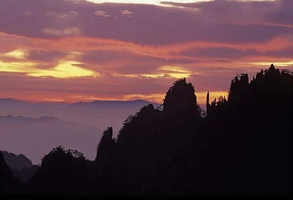 Silhouette of Mt. Huangshan (Yellow Mountain) at sunset, Anhui Province, China