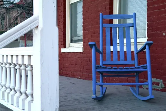 Framed Print : Silver City, New Mexico, United States. Old blue rocker on porch