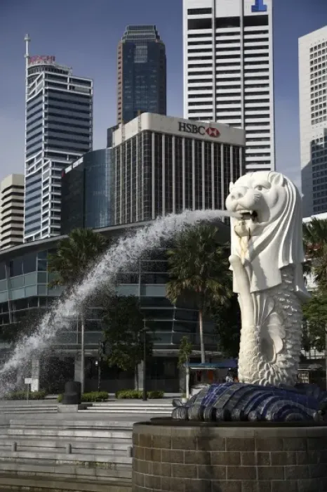 Framed Print : Singapore. Merlion statue in the Merlion Park with high rise office towers in Financial