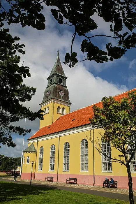 Framed Print : Skagen, Denmark. Ved Church with terra cotta tile roof