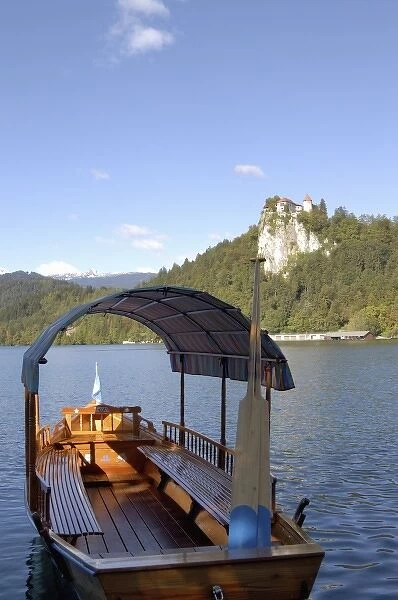 Slovenia, Bled, Lake Bled, pletna boat and Bled Castle