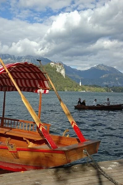 Slovenia, Bled, Lake Bled, pletna boat and Bled Castle
