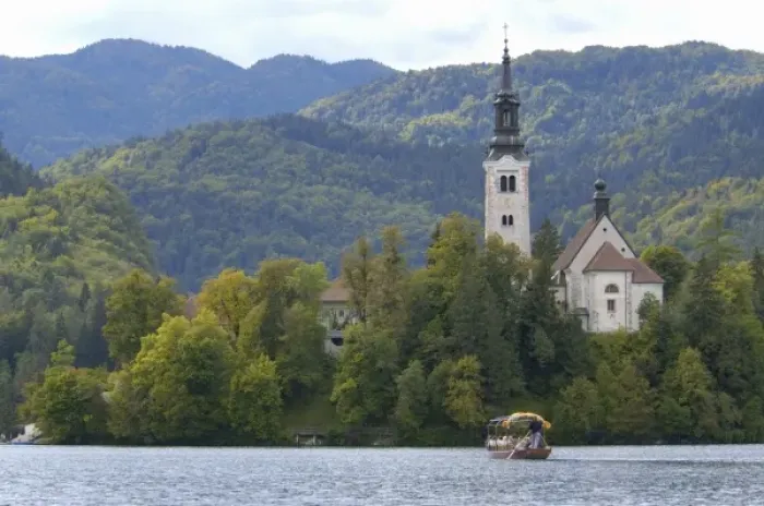 Framed Print : Slovenia, Bled, Lake Bled, pletna boat and Bled Island chapel