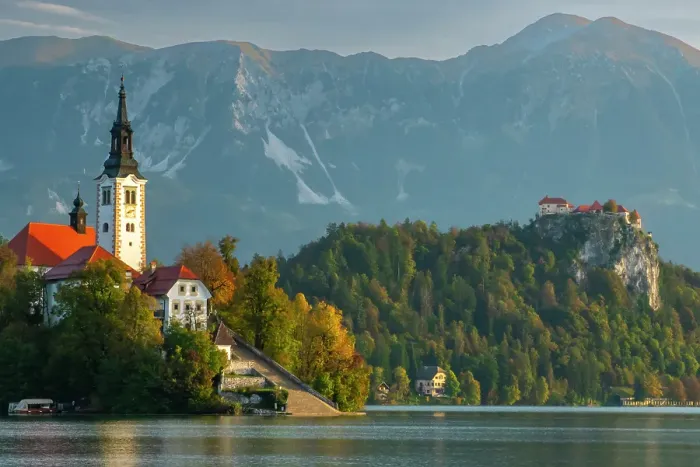Framed Print : Slovenia, Bled, Lake Bled. Town and island church reflect in lake. ©Cathy & Gordon Illg / Jaynes Gallery / DanitaDelimont.com Framed Print : Slovenia, Bled, Lake Bled. Town and island church reflect in lake. ©Cathy & Gordon Illg / Jaynes Gallery / DanitaDelimont.com