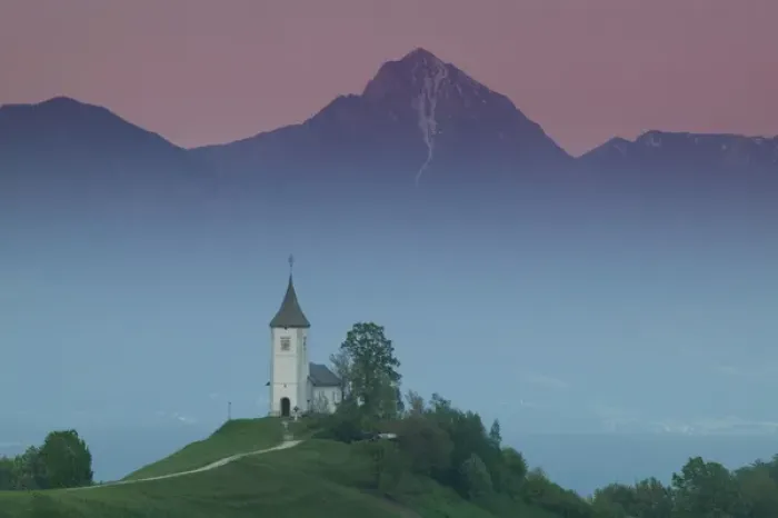 Framed Print : SLOVENIA-GORENJSKA-Jamnik: Church of St. Prim & Kamnik-Savinja Alps  /  Evening