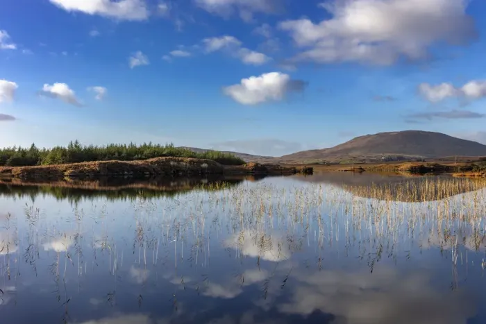 Framed Print : Small lake reflecting clouds near Clifden, Ireland Framed Print : Small lake reflecting clouds near Clifden, Ireland
