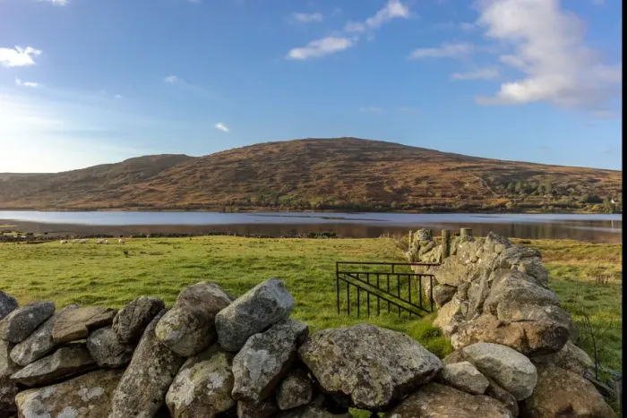 Framed Print : Small lake with stone fence and sheep in pasture near Clifden, Ireland