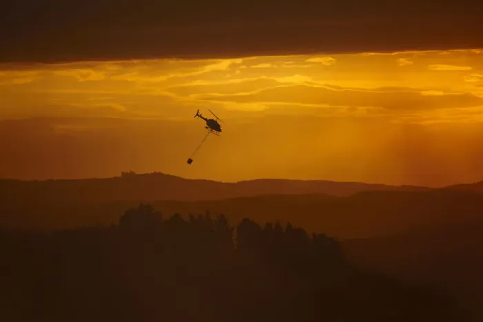 Framed Print : Smokey sunset and helicopter fighting fire at Burnside, Dunedin, South Island, New Framed Print : Smokey sunset and helicopter fighting fire at Burnside, Dunedin, South Island, New
