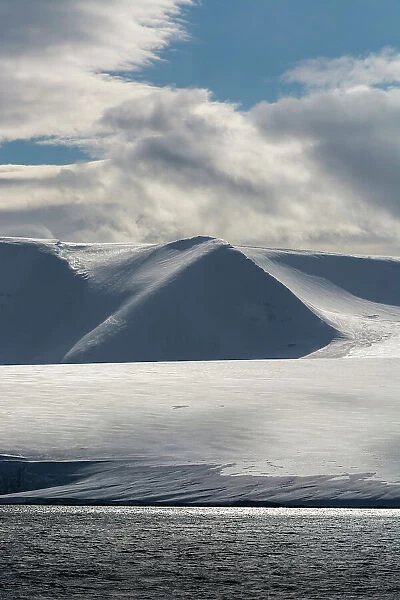 Snow-covered mountains in Hinlopen Strait. Nordaustlandet, Svalbard, Norway