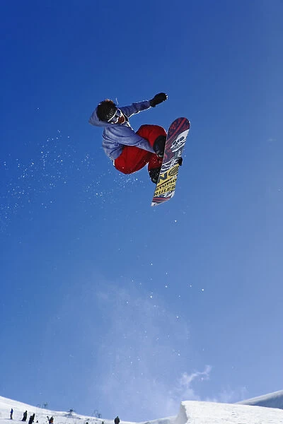 Snowboarder jumping in halfpipe, Klein Matterhorn, Zermatt, Switzerland, Model Released