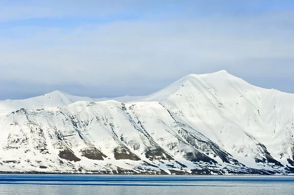 Snowcapped peaks Woodfjord Svalbard Archipelago, Norway