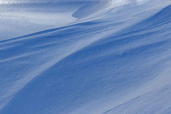 Snowdrift reflecting blue sky, Kalispell, Montana