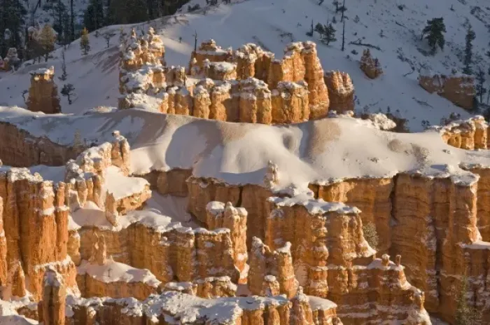 Framed Print : Snowy winter landscape of the hoodoo--a pillar of rock left by erosion--structures Framed Print : Snowy winter landscape of the hoodoo--a pillar of rock left by erosion--structures