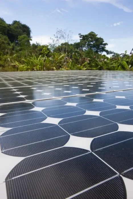 Framed Print : Solar panels under a blue sky power Sirena Biological Station in the heart of