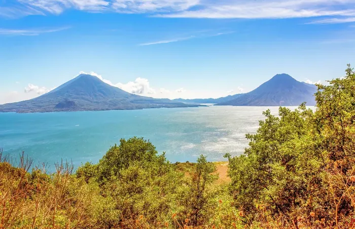 Framed Print : Solola Department, Guatemala. Panoramic view of Lake Atitlan surrounded by three volcanoes, Atitlan, Toliman and San Pedro Framed Print : Solola Department, Guatemala. Panoramic view of Lake Atitlan surrounded by three volcanoes, Atitlan, Toliman and San Pedro