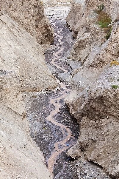 South America, Argentina, Province Salta, Iruya. Mud stream in a tiny Andean village