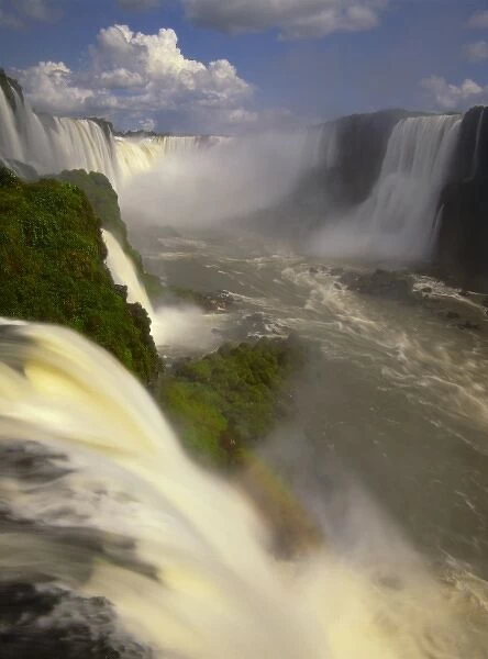 South America, Brazil, Igwacu Falls. Towering Igwacu Falls thunders into the Igwacu River