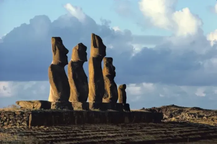 Framed Print : South America, Chile, Easter Island. Warm backlighting silhouettes the moai Framed Print : South America, Chile, Easter Island. Warm backlighting silhouettes the moai