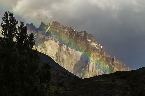 South America, Chile, Patagonia, Torres del Paine National Park. Green rainbow and mountain