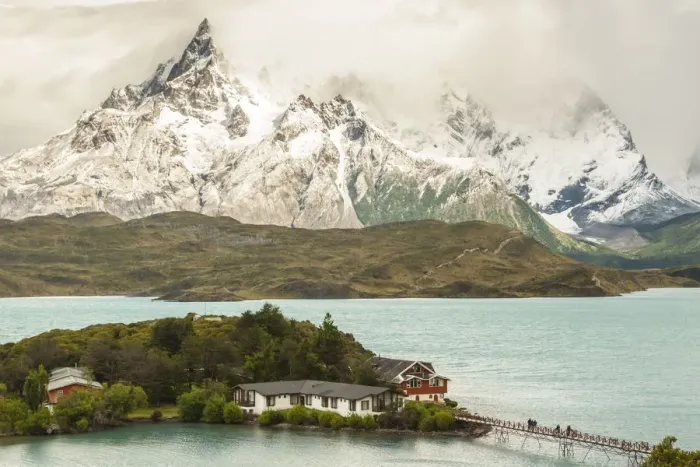 Framed Print : South America, Chile, Patagonia. Lake Pehoe Lodge and The Horns mountains. Credit as Framed Print : South America, Chile, Patagonia. Lake Pehoe Lodge and The Horns mountains. Credit as