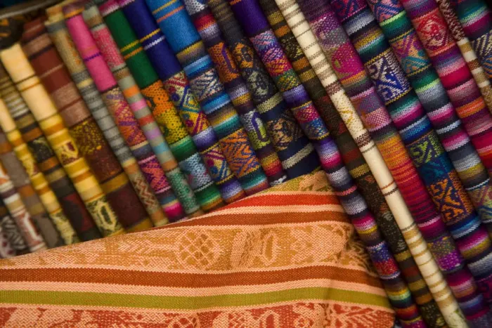 Framed Print : South America, Ecuador, Otavalo, Plaza de Ponchos, tablecloths on display at the Saturday textile Framed Print : South America, Ecuador, Otavalo, Plaza de Ponchos, tablecloths on display at the Saturday textile
