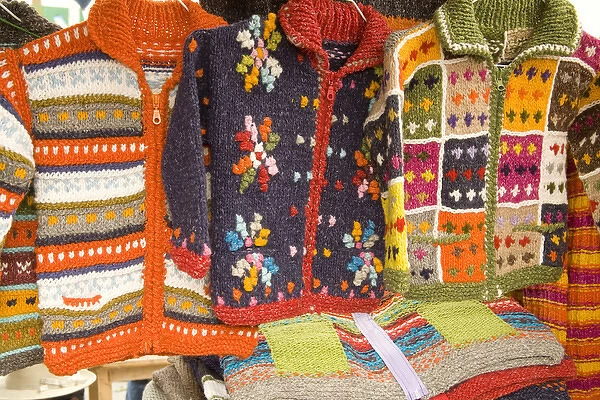 South America, Ecuador, Otavalo, Plaza de Ponchos, sweaters on display at the Saturday textile
