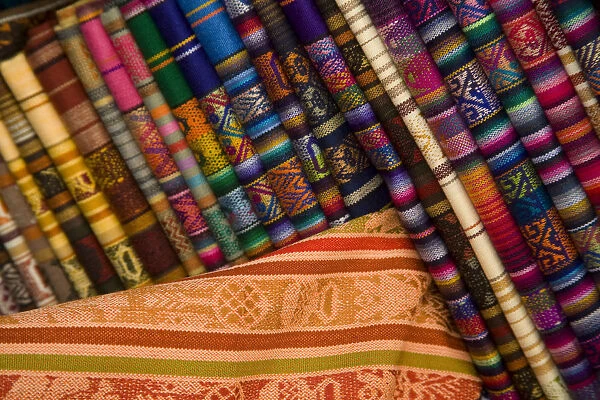 South America, Ecuador, Otavalo, Plaza de Ponchos, tablecloths on display at the Saturday textile