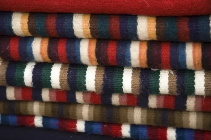 Framed Print : South America, Ecuador, Saquisili, stack of ponchos at weekly food and crafts market Framed Print : South America, Ecuador, Saquisili, stack of ponchos at weekly food and crafts market