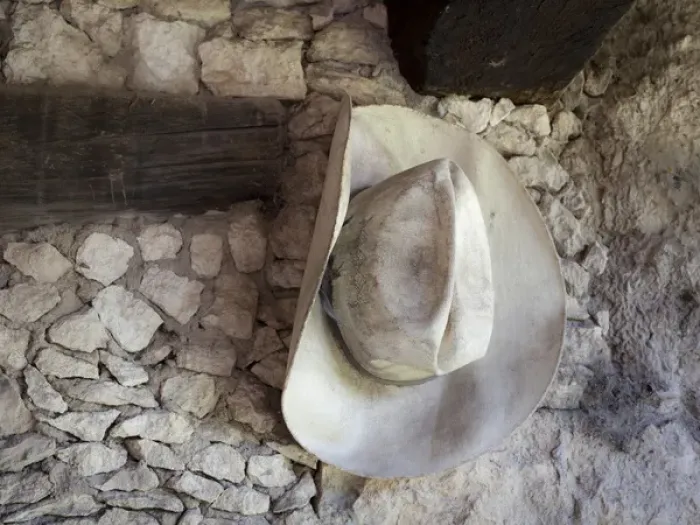 Framed Print : South America, Mexico, Mineral de Pozos. Old cowboy hat hangs on wall. Credit as Framed Print : South America, Mexico, Mineral de Pozos. Old cowboy hat hangs on wall. Credit as