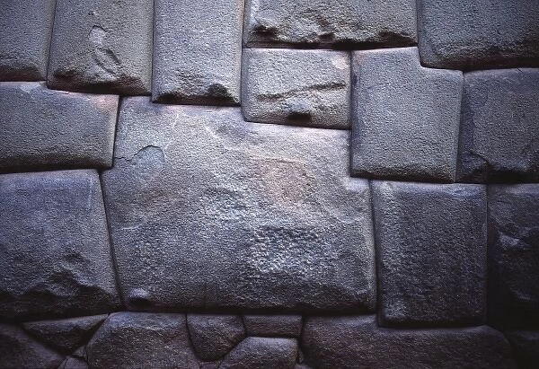 South America, Peru, Cuzco. The cubist geometry of this multi-sided Inca Carved Stone both catches