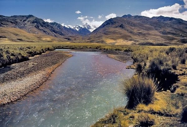 South America, Peru, Huscaran NP. A small stream flows from the Cordillera Blanca