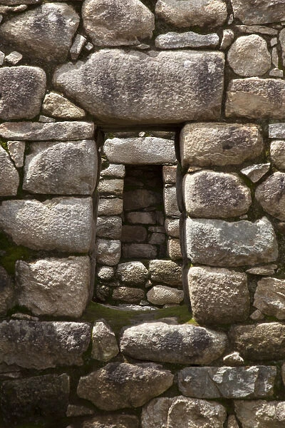 South America, Peru, Machu Picchu. Niche and stone window align perfectly. (UNESCO