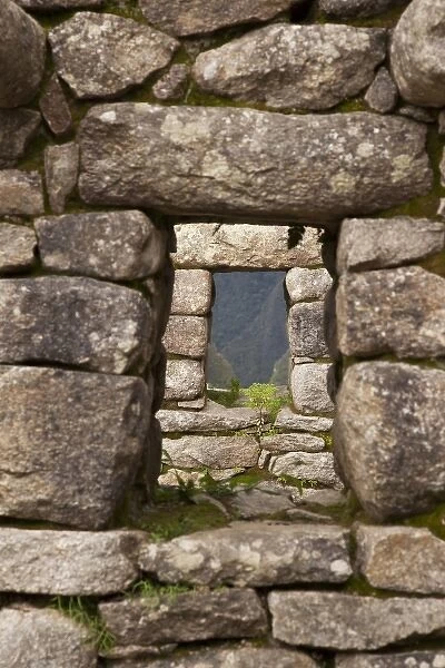 South America, Peru, Machu Picchu. Aligned windows in stone house ruins. (UNESCO