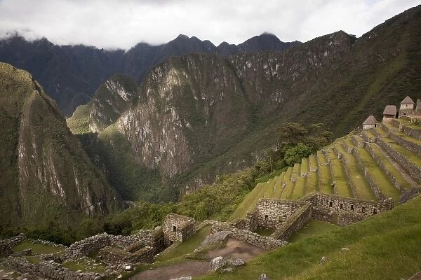 South America, Peru, Machu Picchu. View of agricultural terraces and surrounding mountains